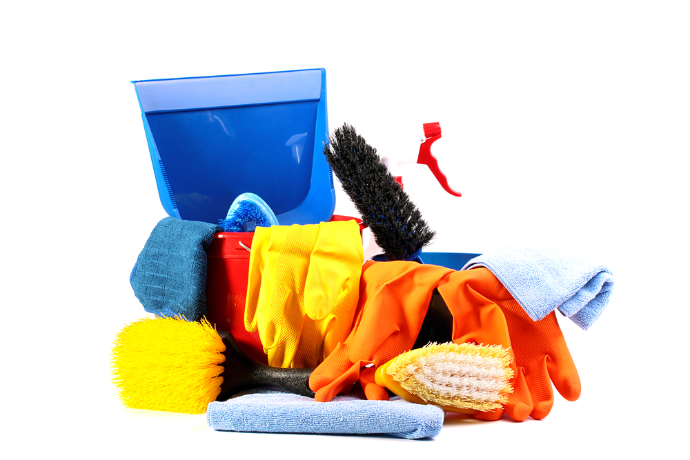 Cleaning bucket with tons of house cleaning supplies 
